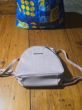 Steve Madden Pale Pink Embossed Mini Backpack